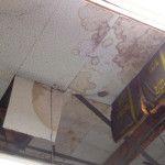 Stains on Ceiling Tiles Due to a Leak